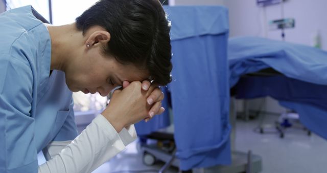 Stressed Medical Professional Taking a Breather in Hospital Room - Download Free Stock Images Pikwizard.com