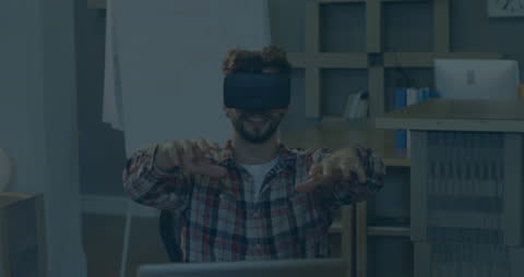 Businessman Engaged with Virtual Reality Tech in Office