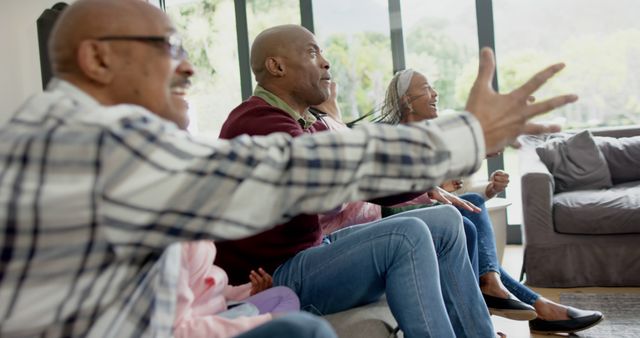 Older African American Group Cheering and Celebrating at Home - Download Free Stock Images Pikwizard.com