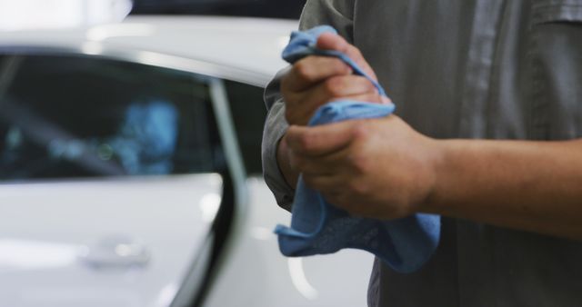 Mechanic Cleaning Hands with Rag after Car Repair - Download Free Stock Images Pikwizard.com