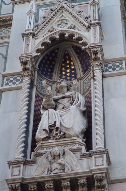 Ornate Statue of Person in Robes - Download Free Stock Photos Pikwizard.com