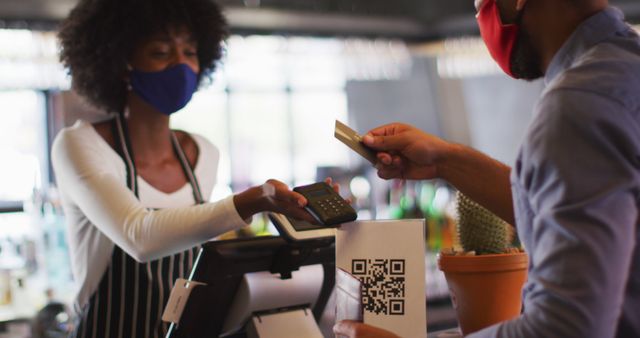 Customers and Merchant Using Contactless Payment in Cafe While Wearing Masks - Download Free Stock Images Pikwizard.com