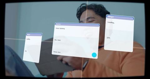 Man tapping tablet while viewing floating ui panels, wearing smartwatch in minimalist room