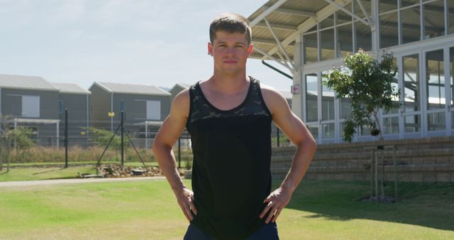 Confident Young Man Standing Outdoors on a Sunny Day - Download Free Stock Images Pikwizard.com