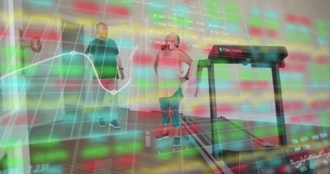 Couple exercising in home gym while monitoring live stock market charts and fitness data