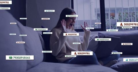 Excited Woman Reacting to Digital Impact in Living Room