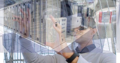 Man Using VR Headset Overlays with Server Room