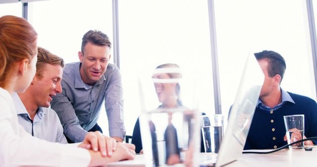 Team members discussing project in meeting room - Download Free Stock Images Pikwizard.com