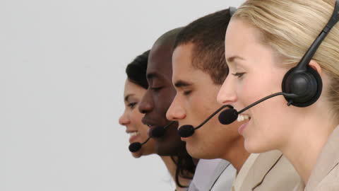 Diverse Team Employing Customer Support Strategies Through Headsets