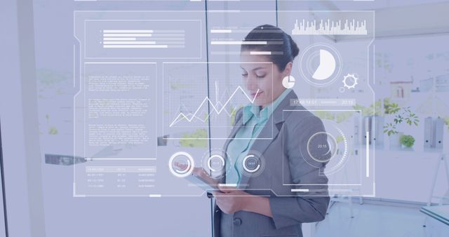 Businesswoman Analyzing Data on Digital Tablet with Infographics - Download Free Stock Images Pikwizard.com