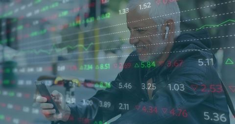 Senior man engaging with stock market using smartphone