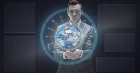 Businessman Holding Holographic Global Icons in Futuristic Interface