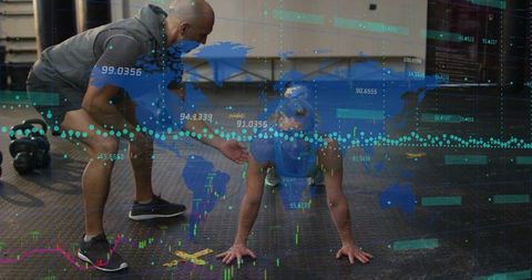 Coach guiding athlete through plank workout in high-tech gym with data overlay