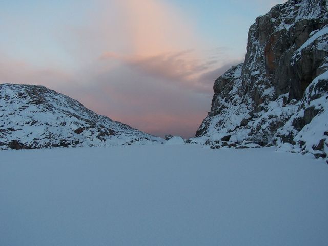 Snow-covered mountain pass with pink sunrise sky - Download Free Stock Photos Pikwizard.com