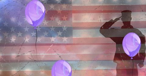 Soldier saluting american flag with floating balloons celebration