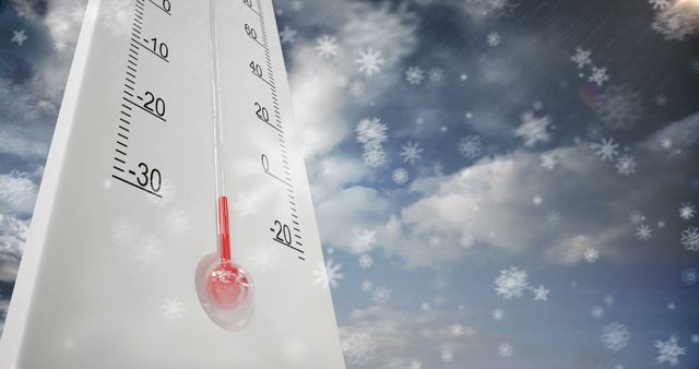 Thermometer displaying subzero temperatures with snowfall against a cloudy sky. Perfect for weather reports, climate change discussions, winter season themes, and educational materials on cold weather.