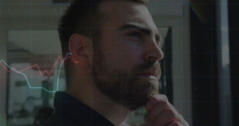 Business Professional Contemplating Financial Analytics in Office