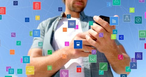 Digital Network Connections over Man Using Smartphone Outdoors