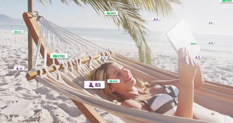 Relaxed Getaway: Woman Using Tablet in Hammock with Data Icons
