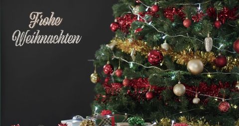 Decorated Christmas Tree with Gifts and German Merry Christmas Text - Download Free Stock Images Pikwizard.com