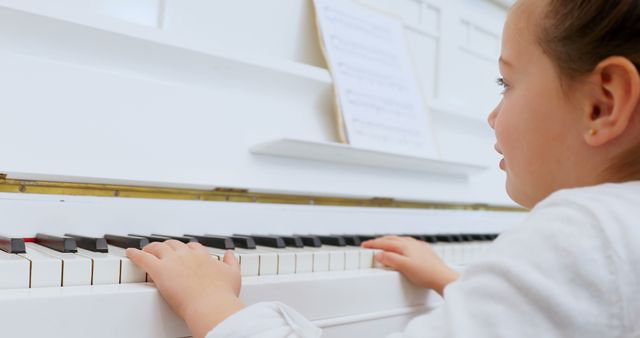 Young Girl Practicing Piano at Home - Download Free Stock Images Pikwizard.com