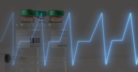 Detailed representation of a digital cardiograph overlaying medicine vials highlights innovation in healthcare. This visual concept is ideal for illustrating advancements in medical technology, pharmaceuticals, and digital health data in presentations, articles, and marketing materials for the healthcare industry.