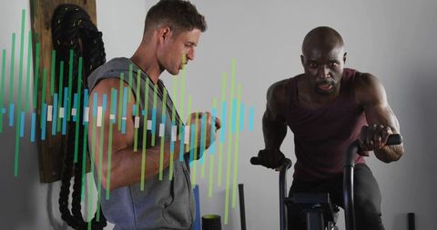 Man pedaling air bike while trainer timing intense workout with equalizer overlay
