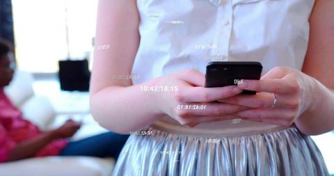 Woman Interacting with Smartphone in Elegant Living Space