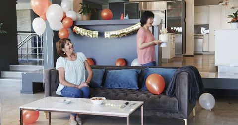 Joyful Multiracial Senior Birthday Celebration at Home