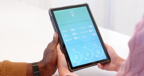 Coworkers Collaborating with Smart Lighting Controls