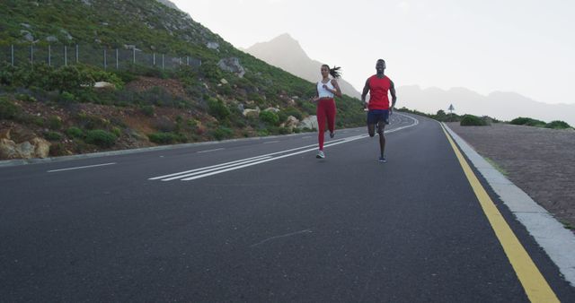 Couple Jogging on Scenic Mountain Road for Healthy Lifestyle - Download Free Stock Images Pikwizard.com