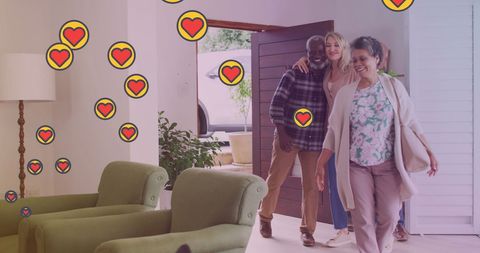 Senior Friends Enjoying Home Gathering With Love Emoticons