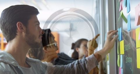 Creative Team Collaborating on Project with Time Management Focus