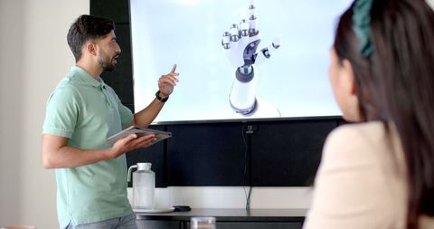 Business Professional Presenting Robotics Technology - Download Free Stock Images Pikwizard.com