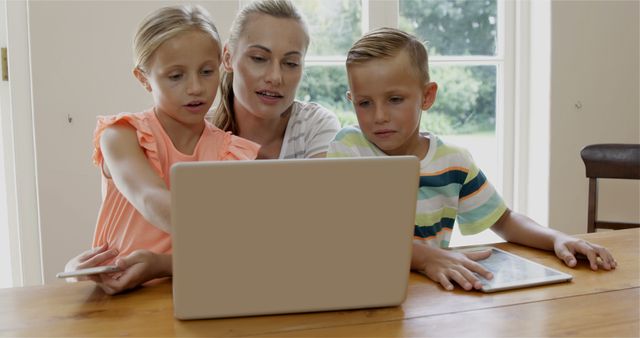 Mother Helping Children with Online Learning at Home - Download Free Stock Images Pikwizard.com