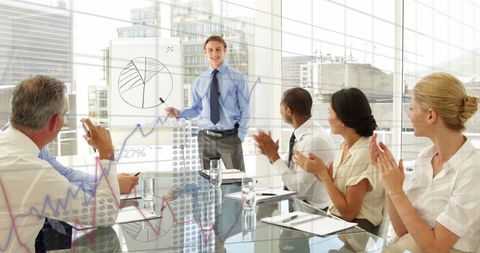 Successful presentation garnering applause from colleagues