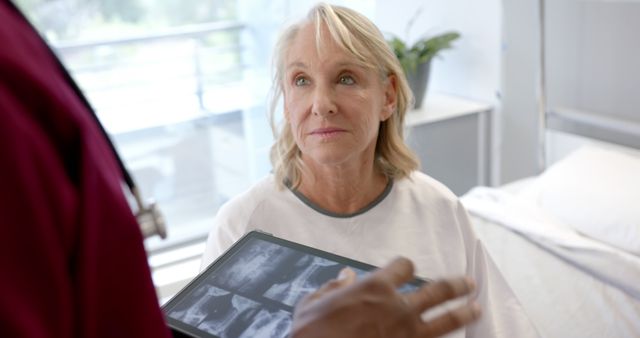 Senior Woman at Medical Appointment Listening to Doctor - Download Free Stock Images Pikwizard.com