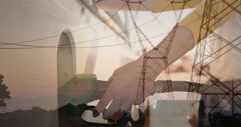 Energy transition concept: fuel pump and electricity pylons