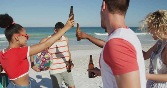 Friends Celebrating with Drinks on Sandy Beach - Download Free Stock Images Pikwizard.com