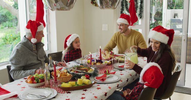 Family Enjoying Christmas Dinner Together in Festive Home Setting - Download Free Stock Images Pikwizard.com