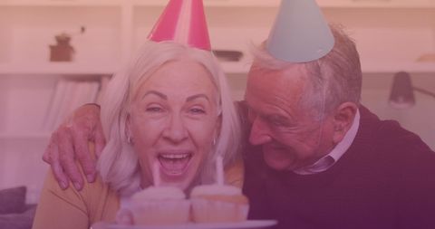 Joyful Senior Couple Celebrating Birthday at Home
