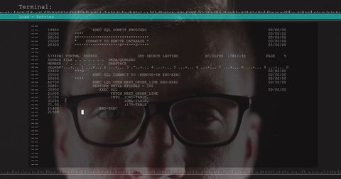 Man with Glasses Analyzing Data on Computer Screen - Download Free Stock Images Pikwizard.com
