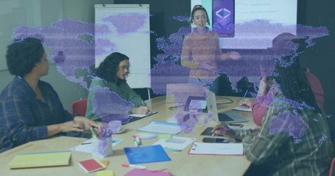 Presenting global strategy with purple holographic world map in collaborative team meeting