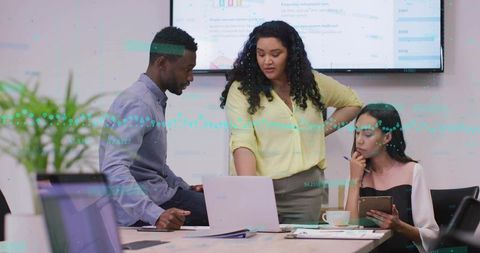 Team Collaborating on Business Analysis in Modern Office