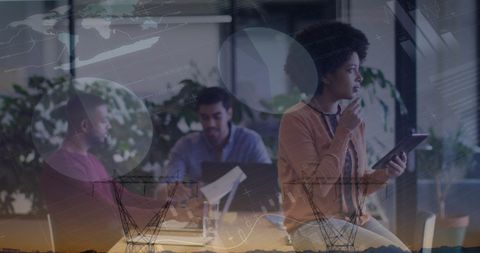 Team Collaborating in Modern Office with Digital Financial Data Overlay