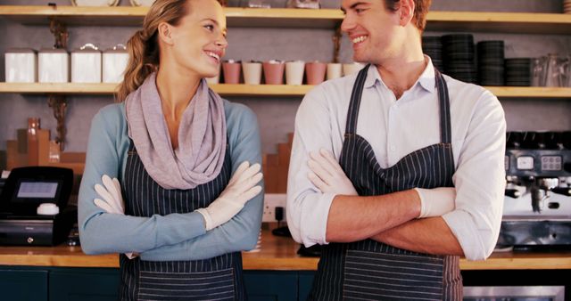 Cheerful Baristas Smiling Behind Cafe Counter - Download Free Stock Images Pikwizard.com