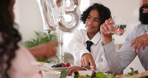 Family Celebration with Lively Conversation and Joyful Atmosphere