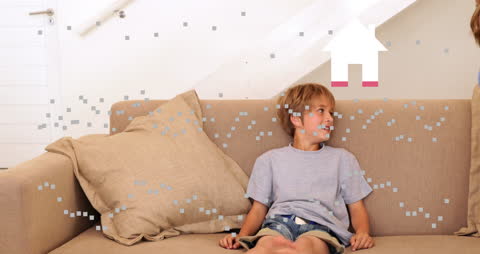 Happy Boy Relaxing on Couch with Digital Overlay