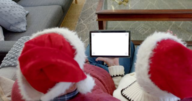 Grandparents Enjoying Christmas Video Call on Digital Tablet - Download Free Stock Images Pikwizard.com