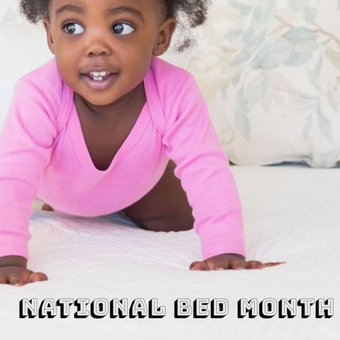Joyful Baby on Bed Celebrating National Bed Month